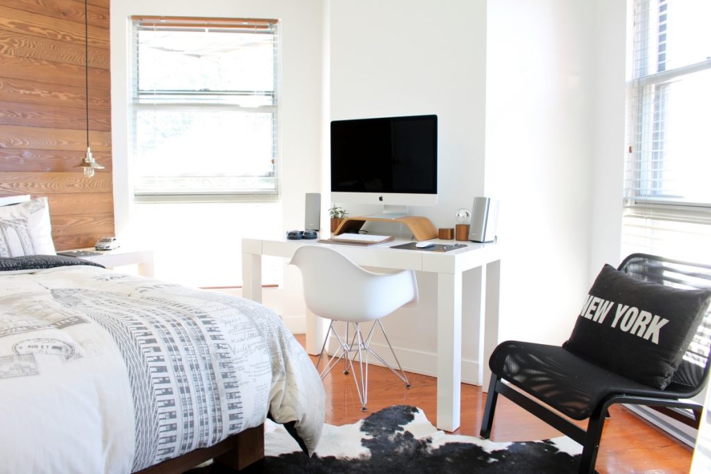 How to include a cozy study space in a modern bedroom